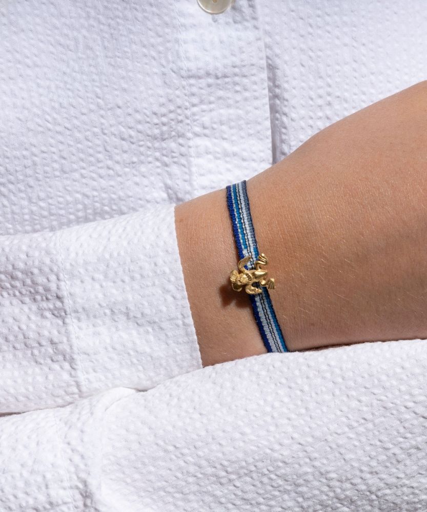 PULSERA CON CHARM - AGUILA QUIMBAYA