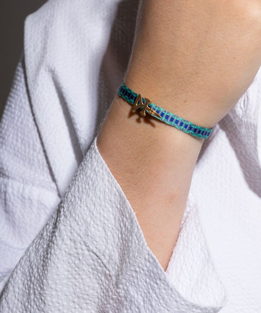 PULSERA CON CHARM - AVE CALIMA