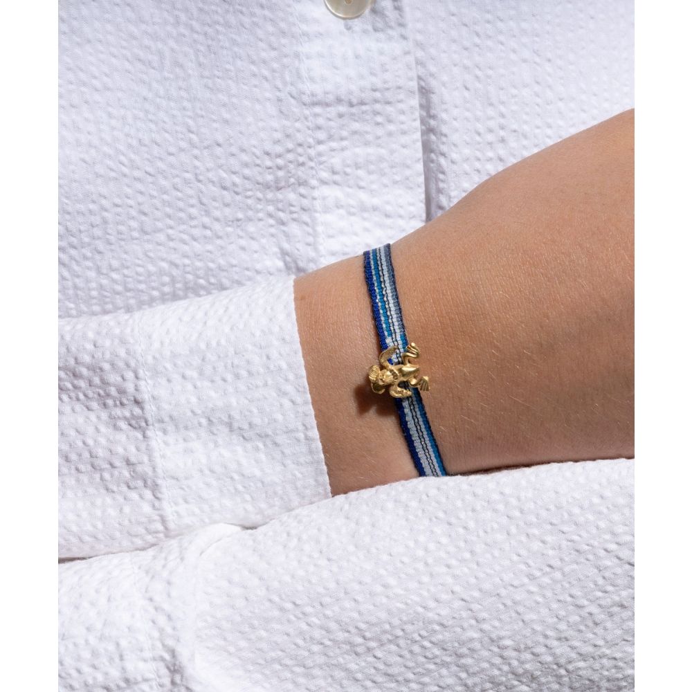 PULSERA CON CHARM - AGUILA QUIMBAYA