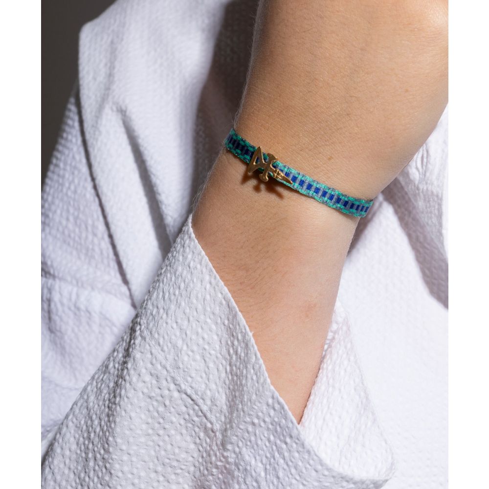 PULSERA CON CHARM - AVE CALIMA