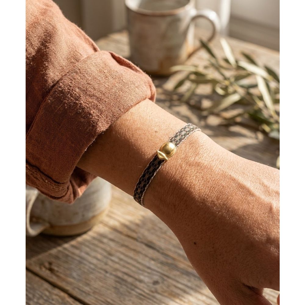 PULSERA CON CHARM - RANA TAIRONA