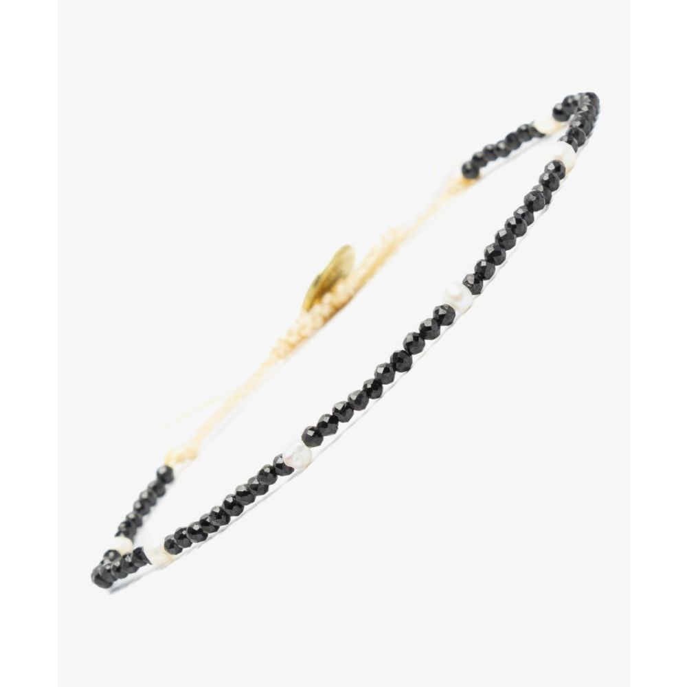 Pulsera TAURUS - PIRITA NEGRA Y PERLAS BEBE