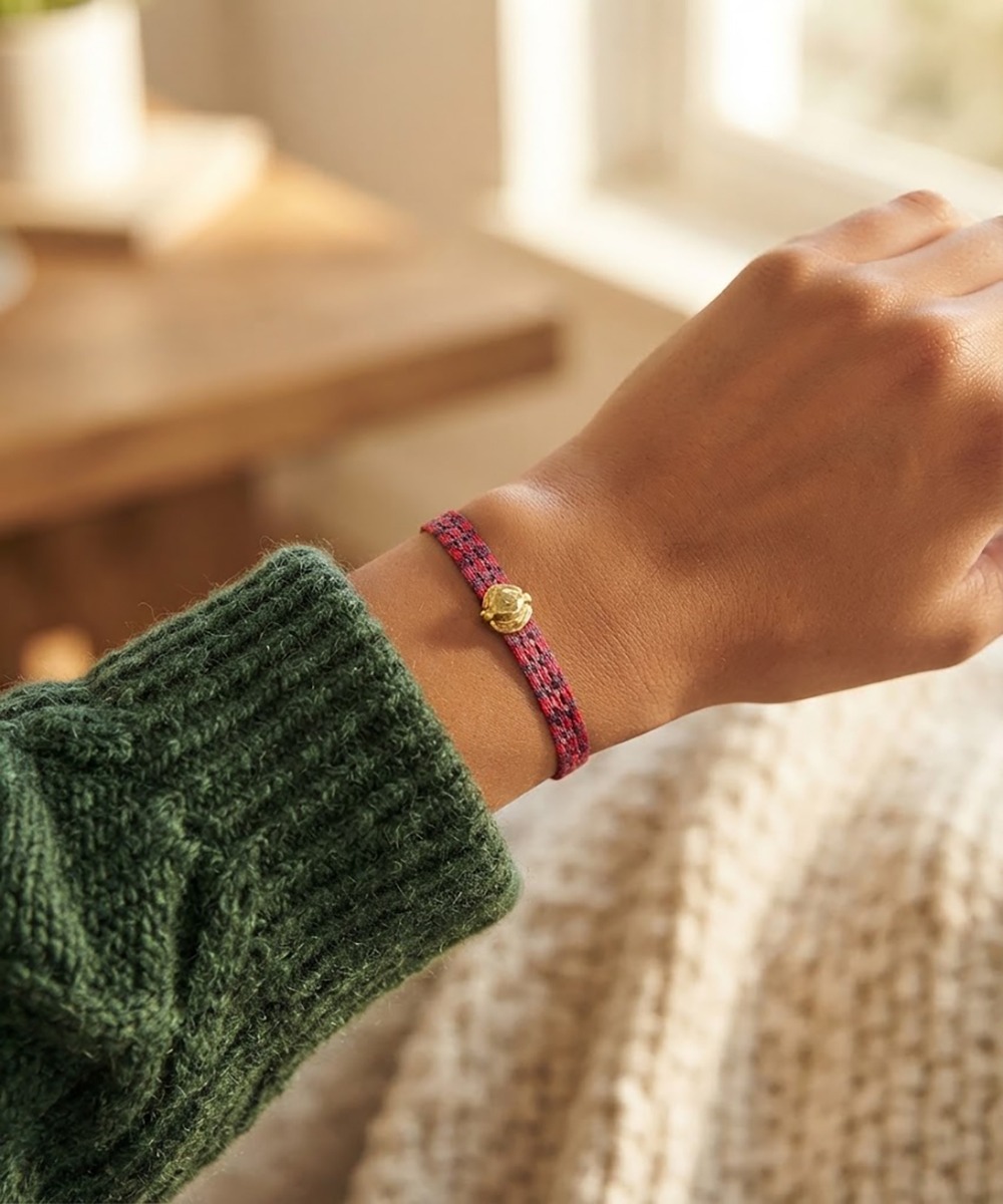 PULSERA CON CHARM - RANA TAIRONA